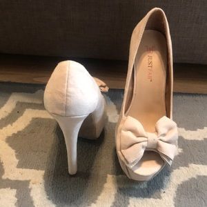 Cream heels with bow detail